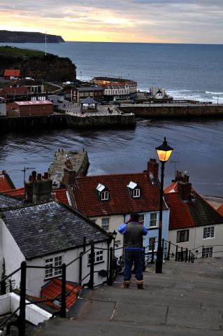 A view of Whitby harbour from part way up some stairs.