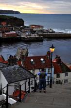 A view of Whitby harbour from part way up some stairs.