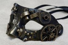 Domino-style mask with steampunk decoration (cogs, pipes, etc).
